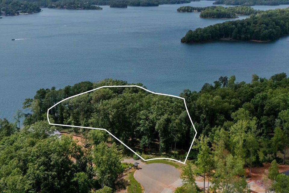 233 Sandy Hollow Court, The Cliffs at Keowee Springs, Six Mile, SC. Offered at $3,995,000. Lake Keowee point lot · 2.3 AC · 425 ft of shoreline.