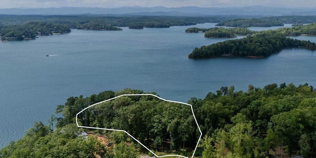 233 Sandy Hollow Court, The Cliffs at Keowee Springs, Six Mile, SC. Offered at $3,995,000. Lake Keowee point lot · 2.3 AC · 425 ft of shoreline.